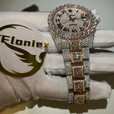 ROLEX DATEJUST ICED OUT WITH ROSE GOLD ROMAN DIAL – LARGE STONES BEZEL TWO-TONE