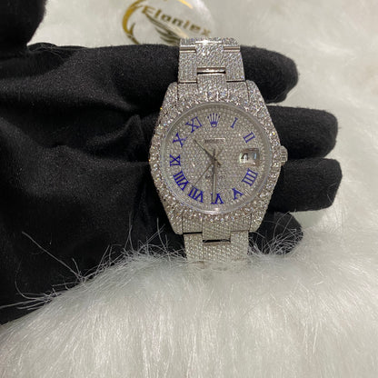ROLEX DATEJUST MOISSANITE WATCH WITH BLUE ROMAN DIAL – FULL ICED SILVER EDITION