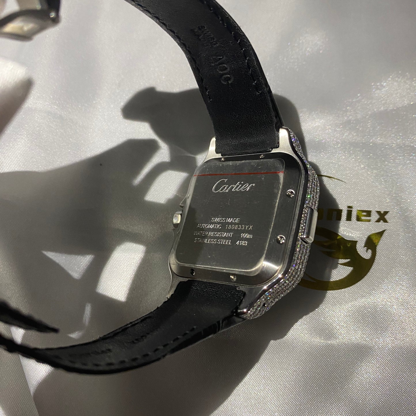 CARTIER SANTOS CHRONOGRAPH WATCH WITH ROMAN DIAL – BLACK LEATHER & DIAMOND BEZEL EDITION